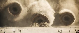 Three sandworms attack soldiers in Dune: Part Two